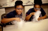 Middle school students making liquid nitrogen ice cream